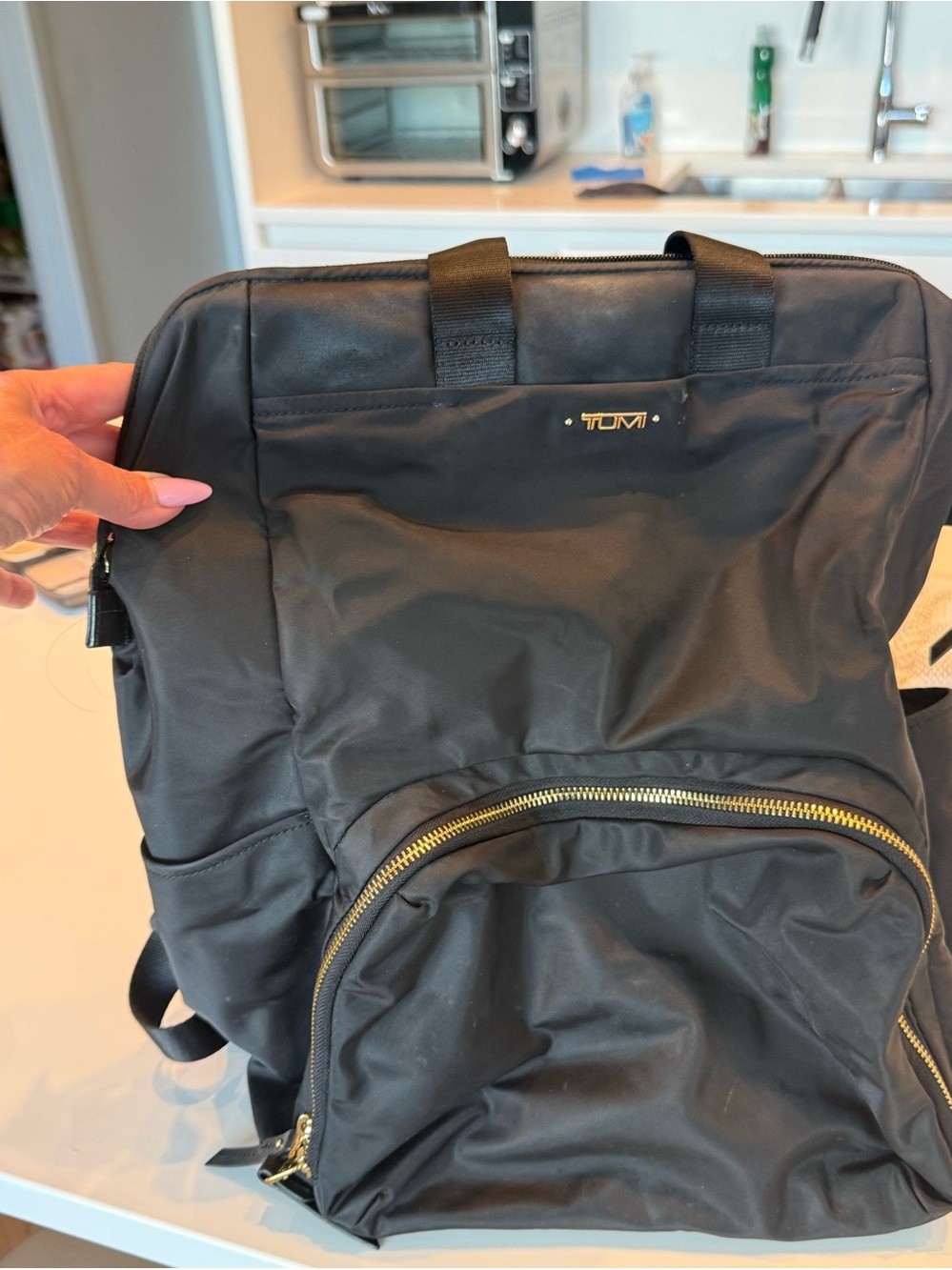 Tumi Black Backpack with Gold Hardware
